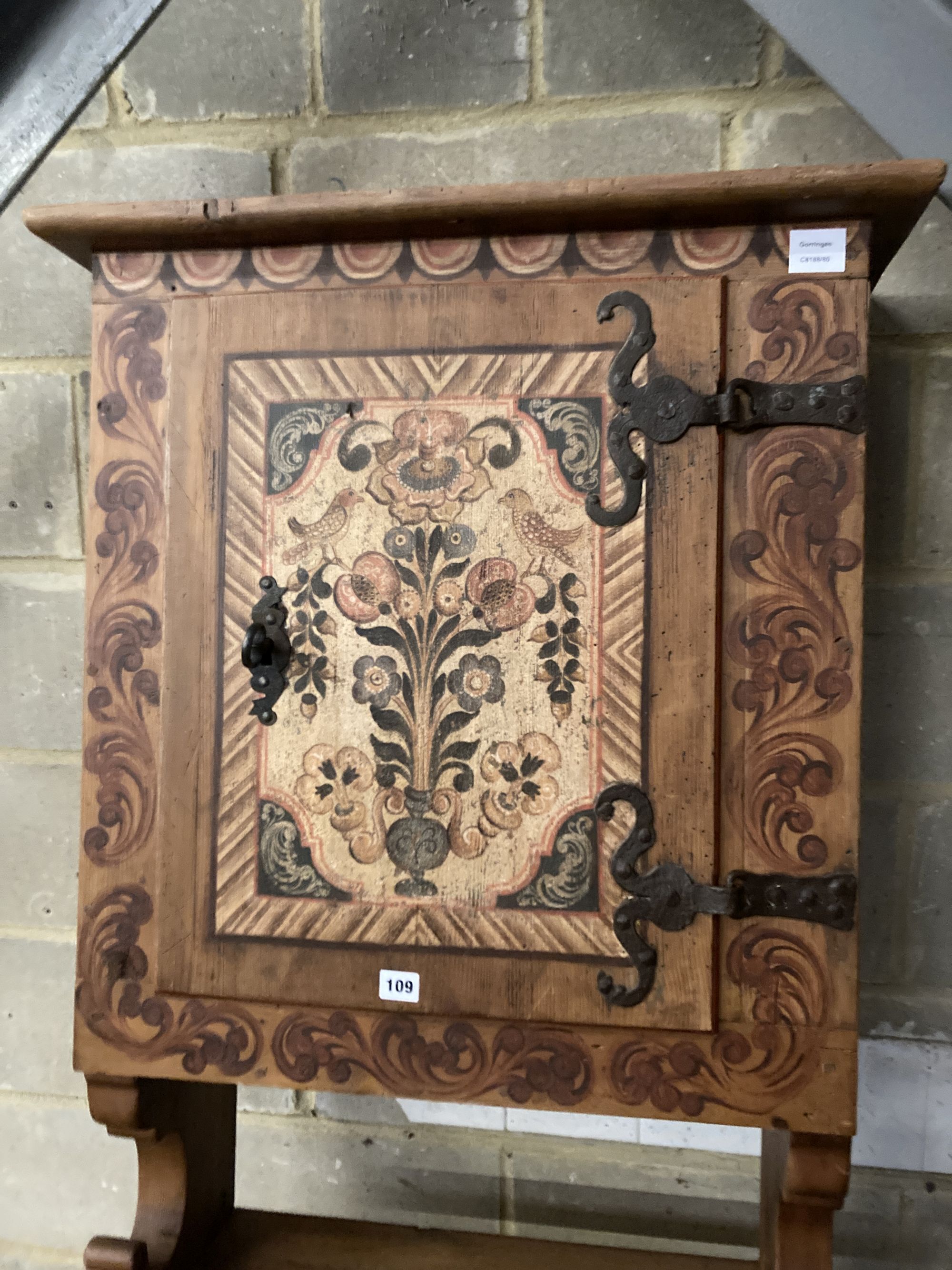 A Swiss painted pine hunting cabinet, width 70cm, height 190cm